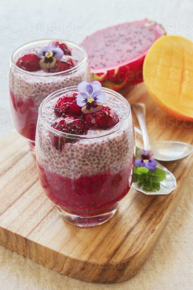 Chia seeds pudding with red dragon fruit and mango - Australian Stock Image