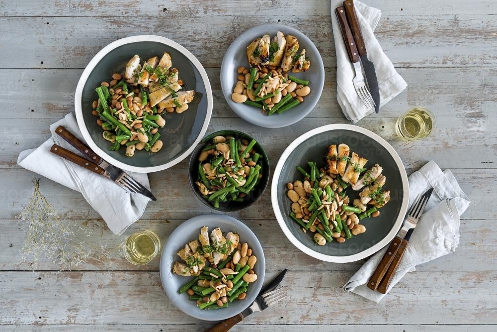 Chicken and bean dish seen from above - Australian Stock Image