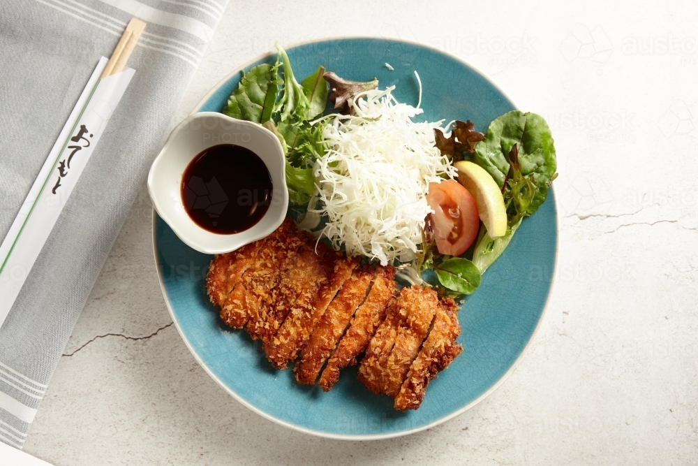 Image of Chicken katsu with salad Austockphoto