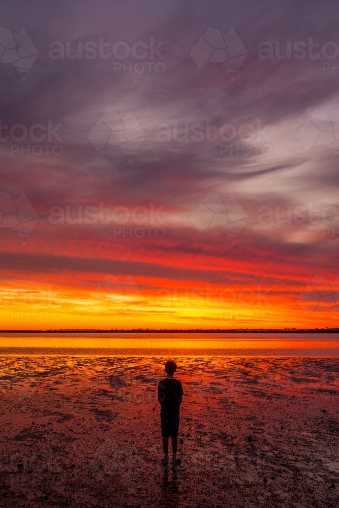 Child and stunning sunset at Port Broughton in Yorke Peninsula, South Australia - Australian Stock Image