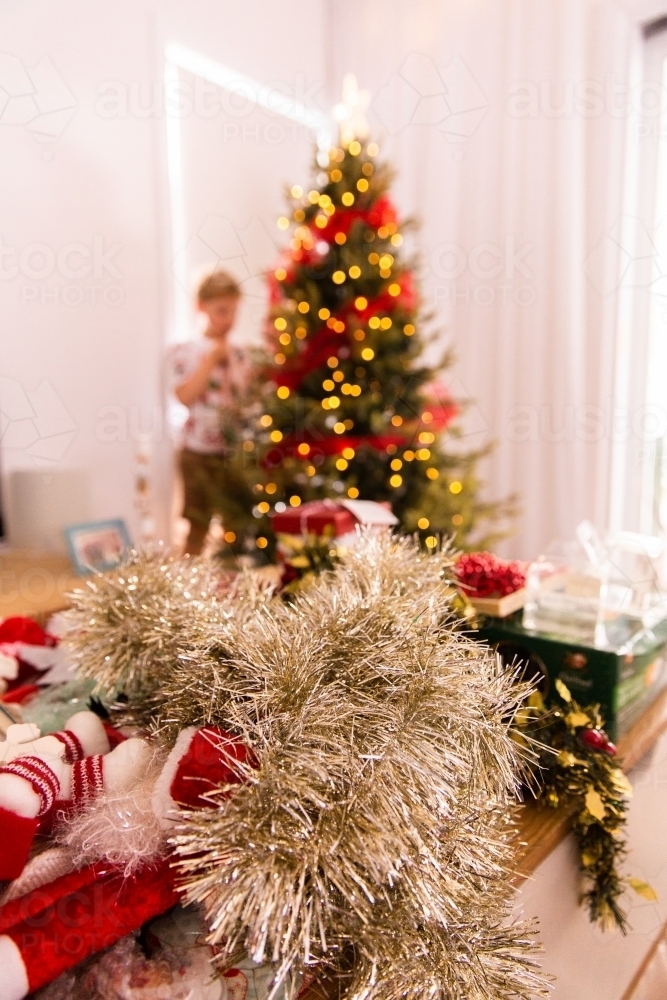 child decorating for Christmas - Australian Stock Image
