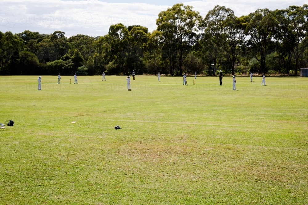 Children playing a game of cricket - Australian Stock Image