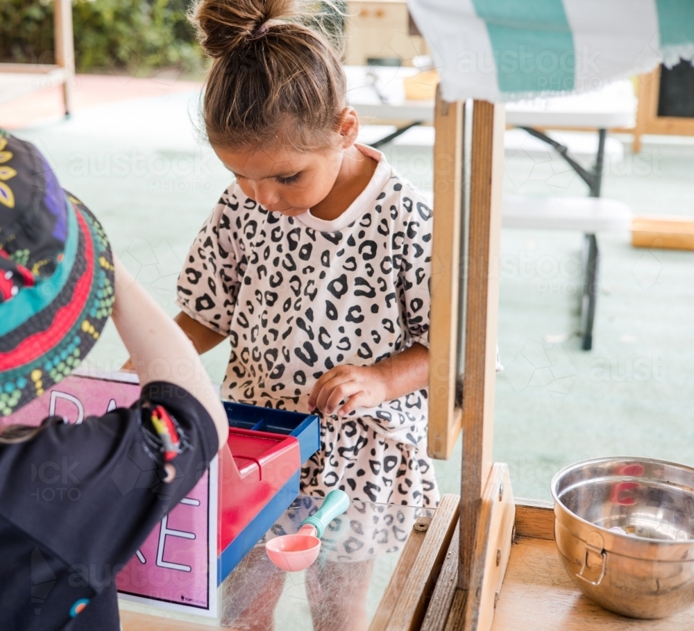 Children playing at a toy shop - Australian Stock Image