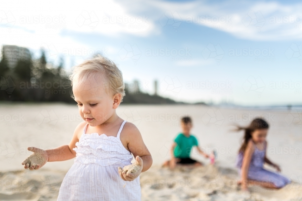 Children playing at the beach - Australian Stock Image