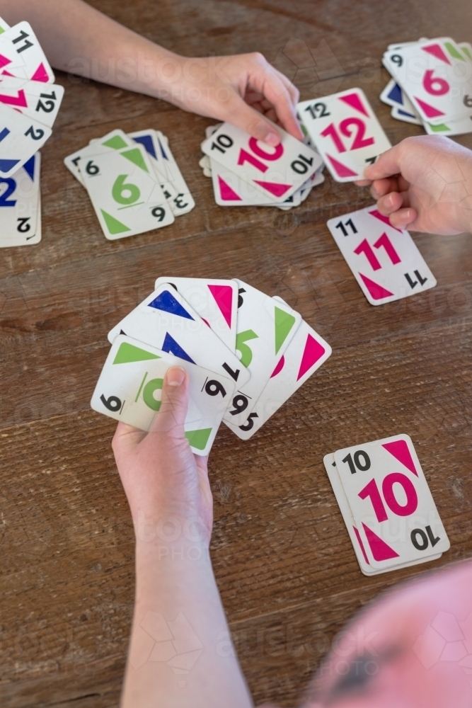 Children playing cards - Australian Stock Image