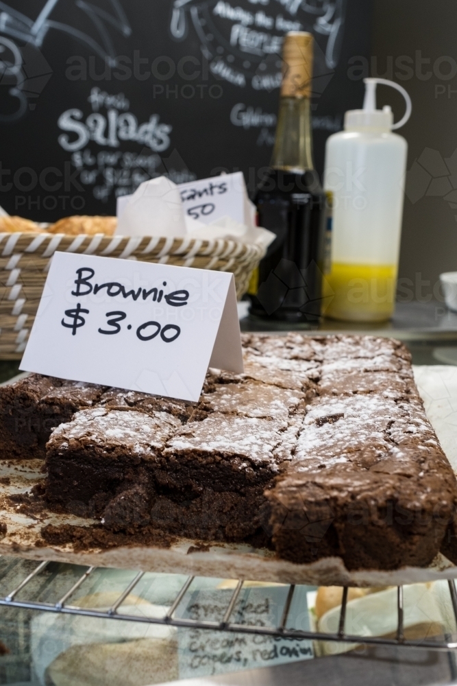 Image of Chocolate Brownies for sale in cafe Austockphoto