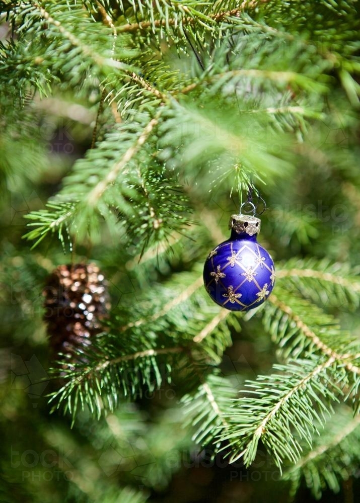 Christmas baubles and decorations on tree - Australian Stock Image