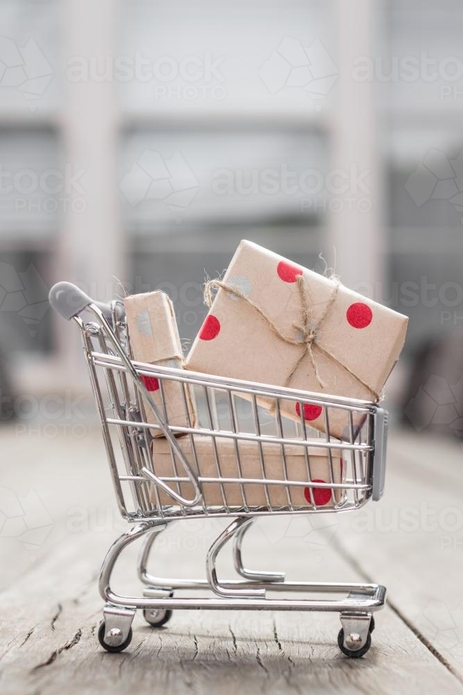 Christmas concept, gifts in a trolley - Australian Stock Image
