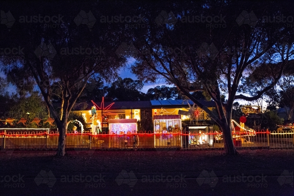 Christmas lights on country house - Australian Stock Image