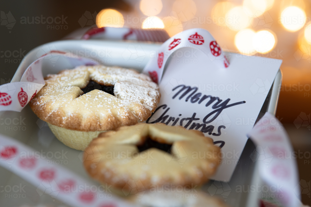 Image of christmas traditional treat, fruit mince pies with a merry ...