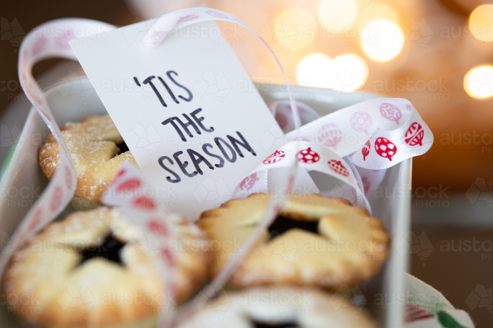 Image of christmas traditional treat, fruit mince pies, with a "tis the ...