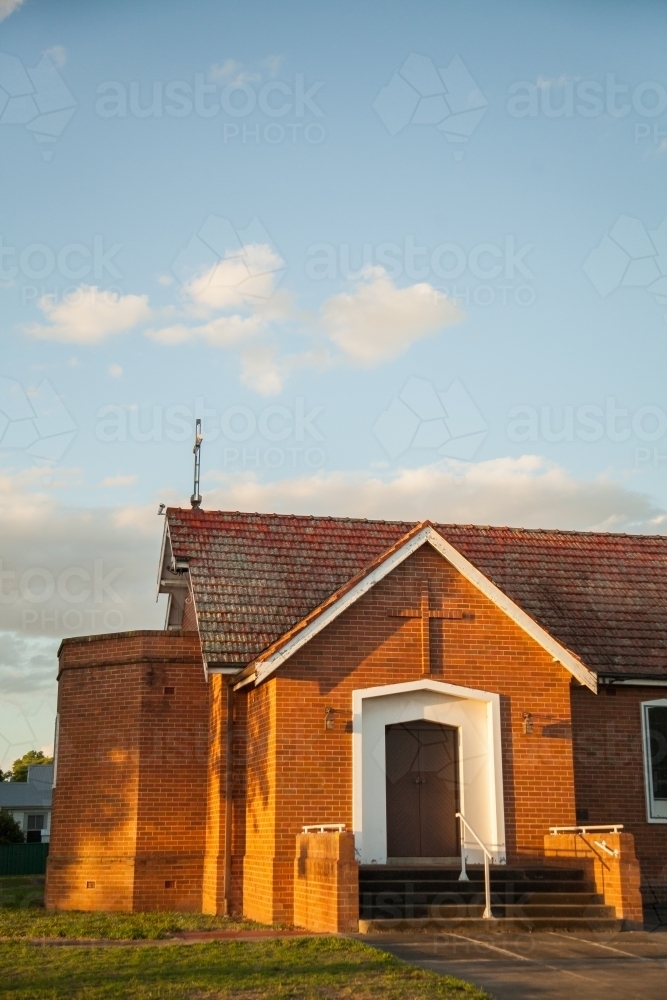 Church building in golden afternoon light - Australian Stock Image