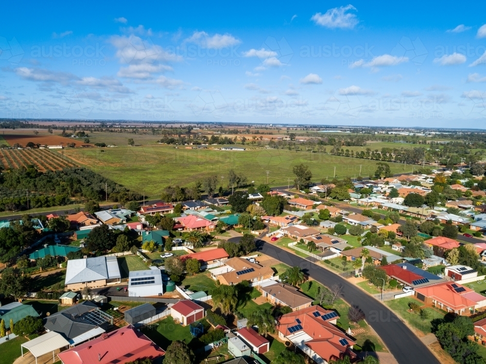 Citrus farm and houses up to the edge of town in Narromine - Australian Stock Image