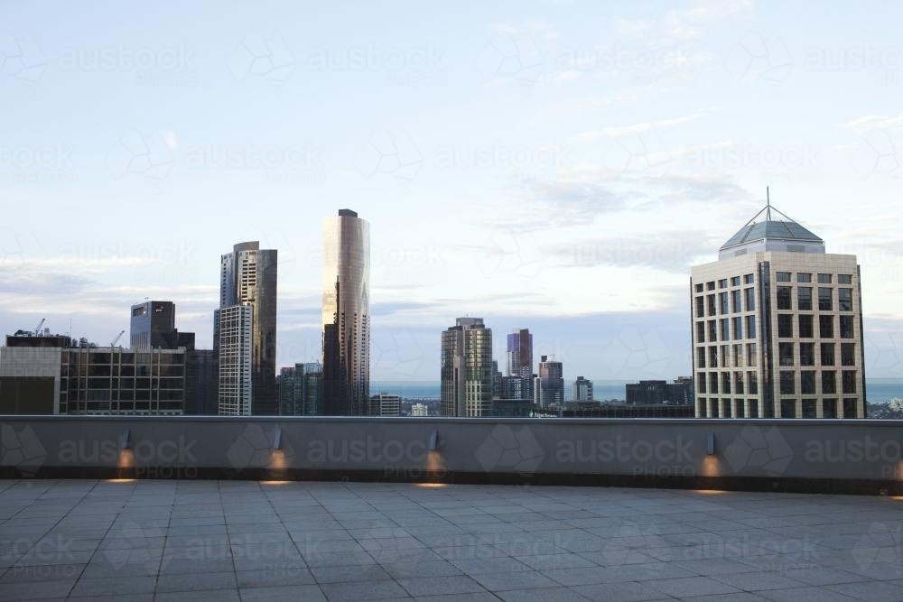 City high rise buildings on the Melbourne skyline at sunrise - Australian Stock Image