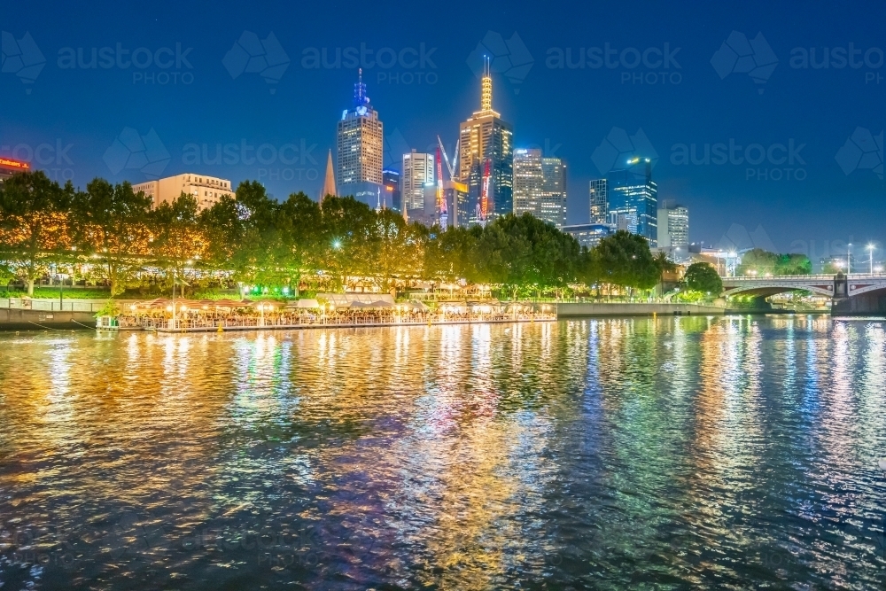 City lights of the Melbourne skyline reflected in the Yarra River - Australian Stock Image