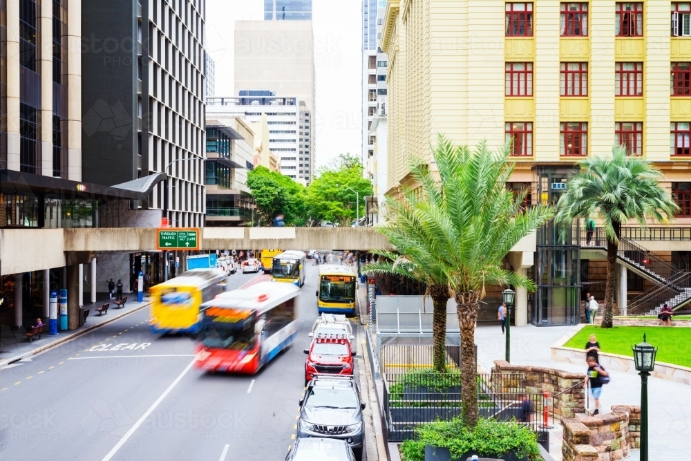 city street with moving bus - Australian Stock Image