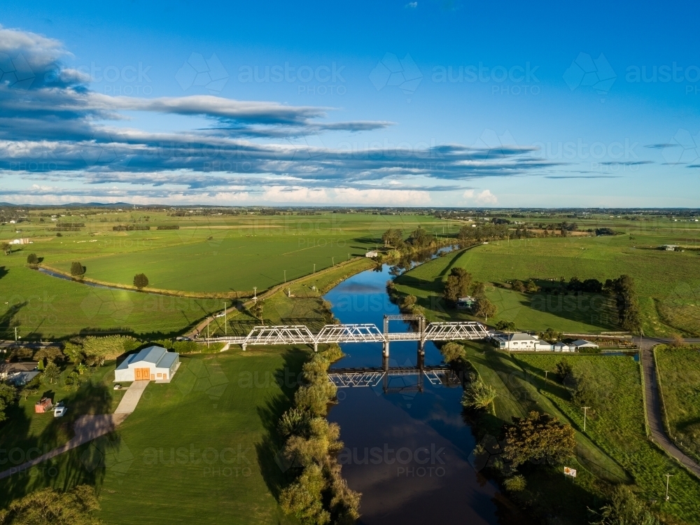 Image of Clarence Town Road and timber truss bridge in green farm ...