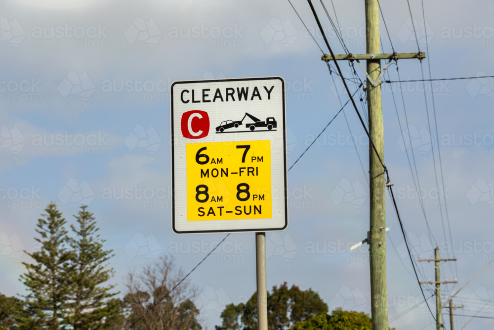 Clearway roadside and power poles beside road in Sydney - Australian Stock Image