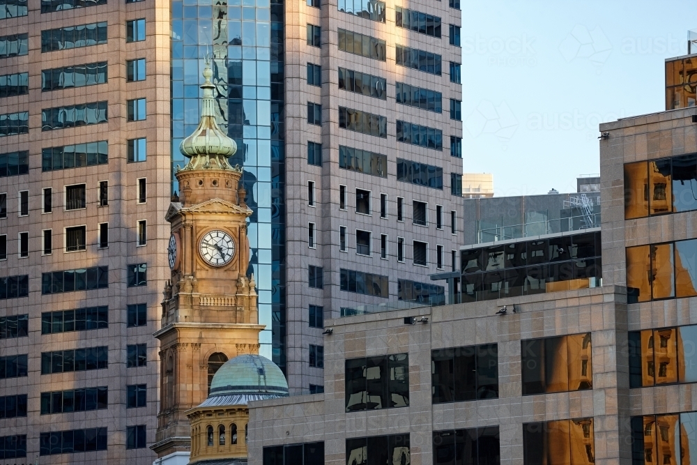 Clock tower and buildings in the city : Austockphoto Clock tower and buildings in the city - Australian Stock Image