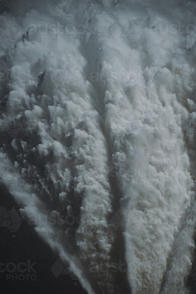 Close up detail of Water flowing from the Hume Dam wall into the Murray River. : Austockphoto Close up detail of Water flowing from the Hume Dam wall into the Murray River. - Australian Stock Image