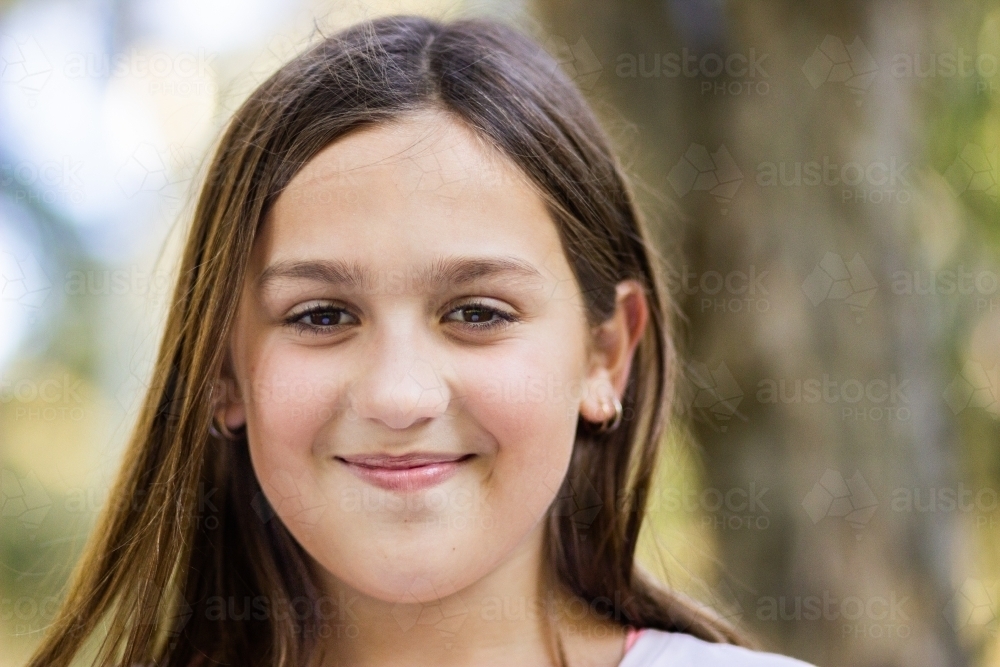 Image of Close up face of happy girl child - Austockphoto