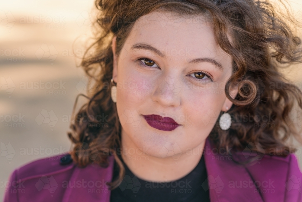 close up head shot of curvy woman - Australian Stock Image