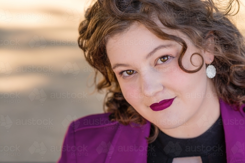 close up head shot of curvy woman - Australian Stock Image