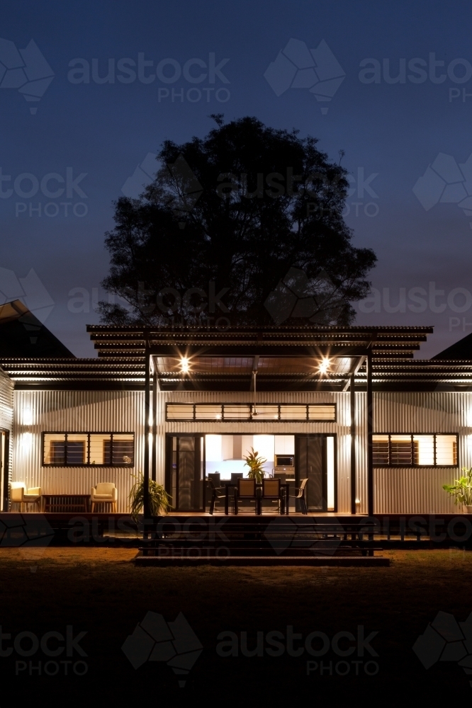 Close up nighttime shot of a modern architecture home. - Australian Stock Image