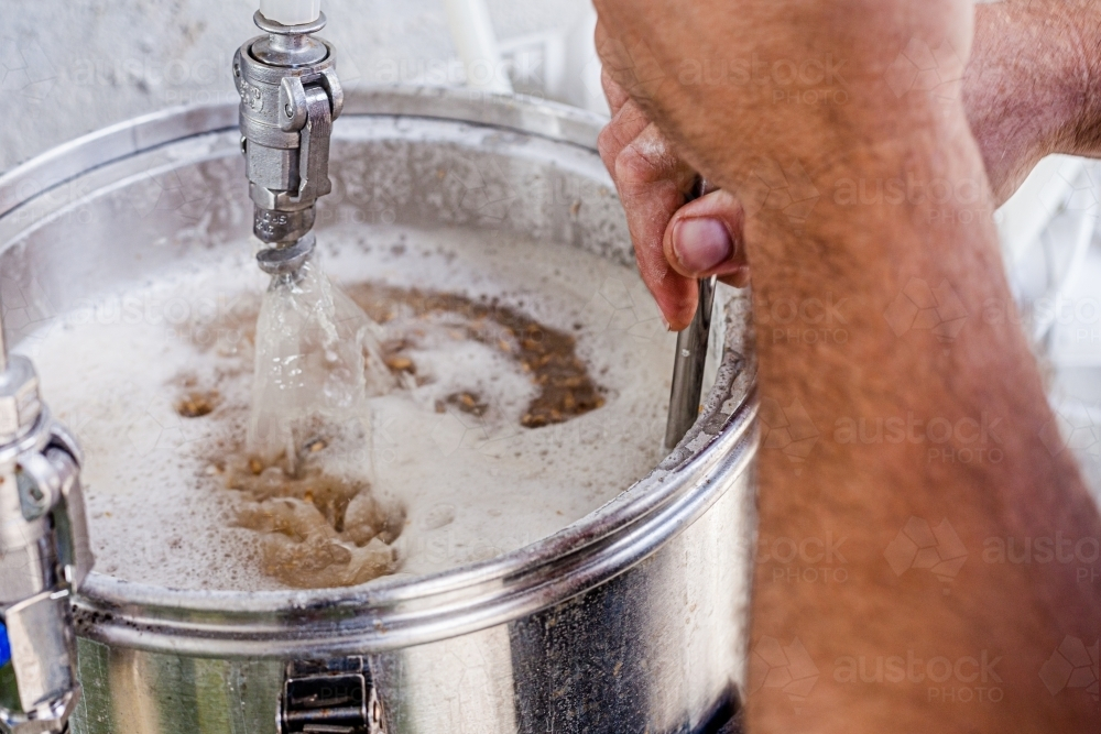 Close-up of a beer mashing procedure. - Australian Stock Image