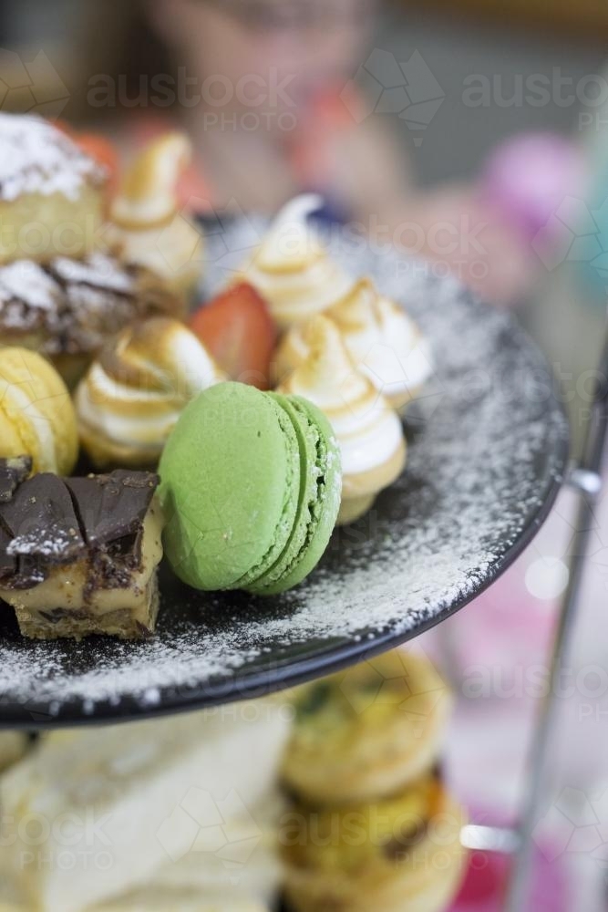 Close up of a platter of sweet desserts for high tea - Australian Stock Image