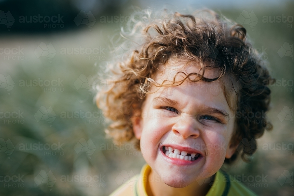 Close up of a smiling boy - Australian Stock Image