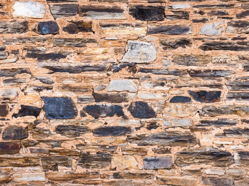 Close up of a stone wall : Austockphoto Close up of a stone wall - Australian Stock Image