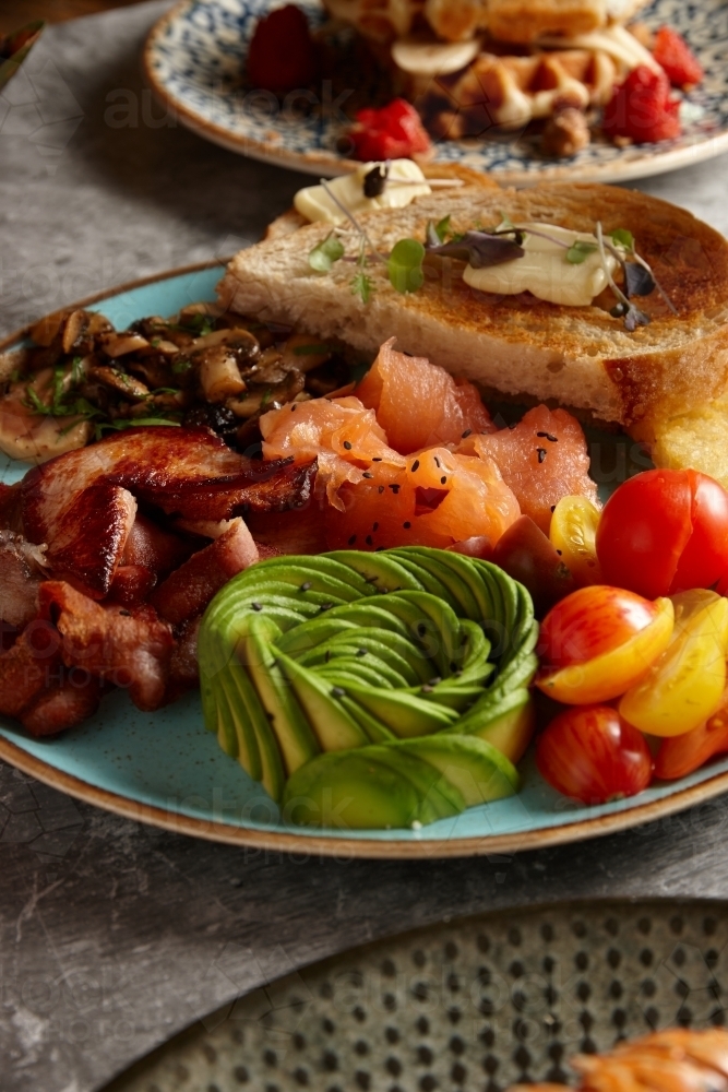 Close up of big breakfast dish on table - Australian Stock Image