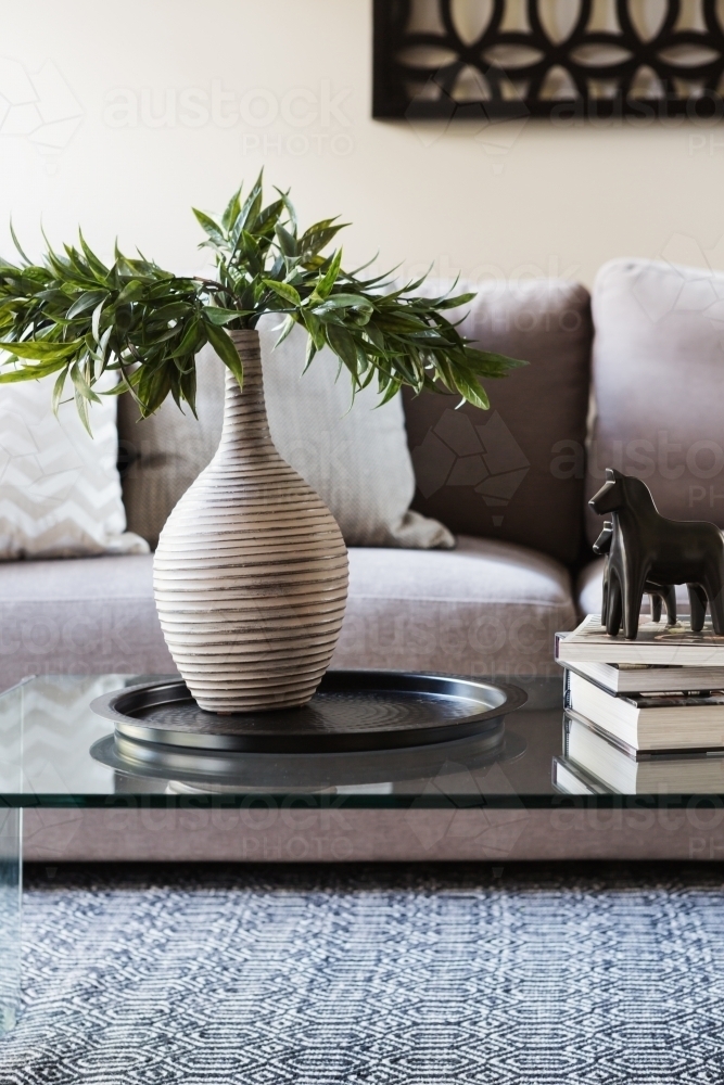 Close up of decor items on a living room coffee table - Australian Stock Image
