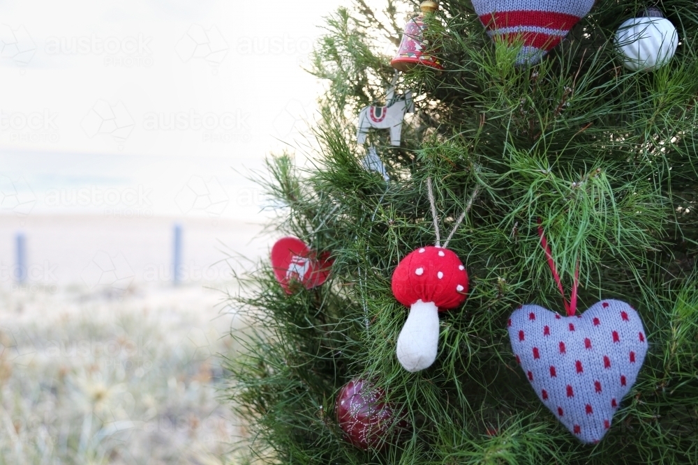 Close up of decorated Christmas tree at beach - Australian Stock Image