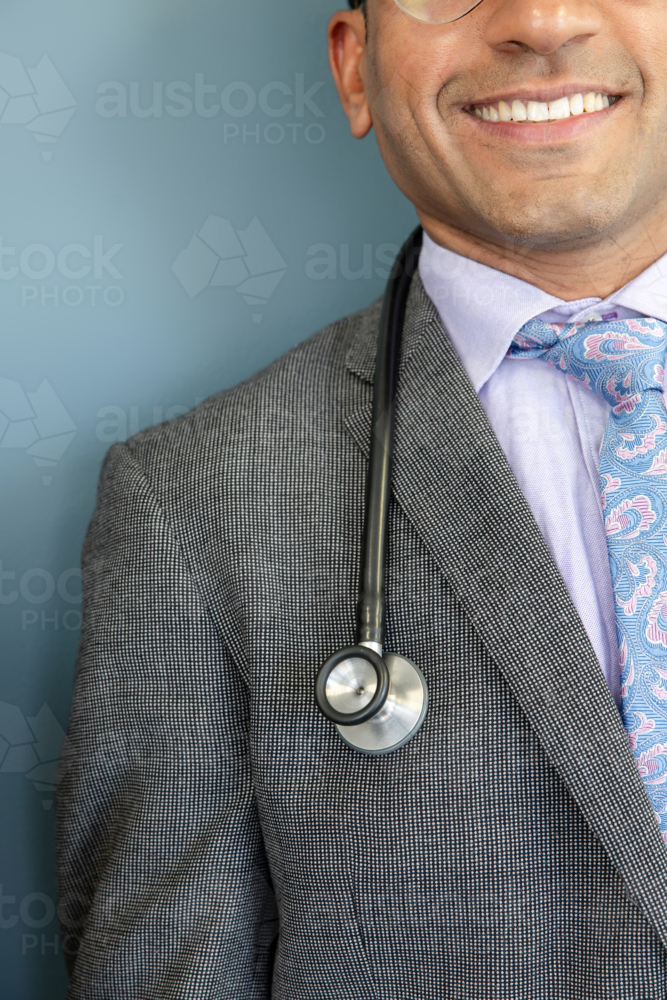 Close-up of doctor with stethoscope around neck - Australian Stock Image