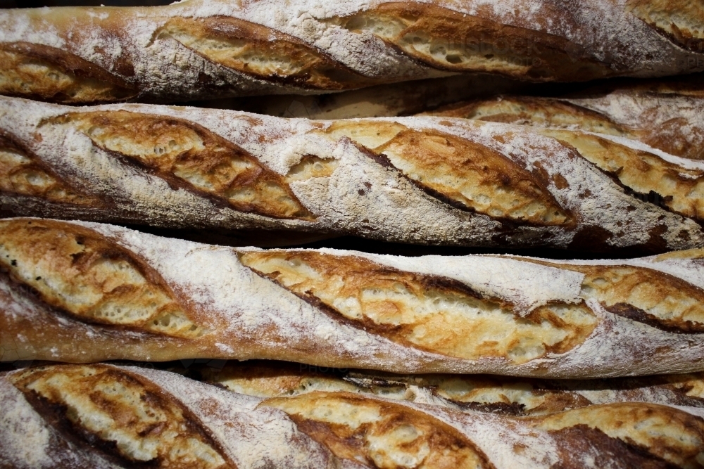 Close up of freshly baked semi sourdough baguettes - Australian Stock Image