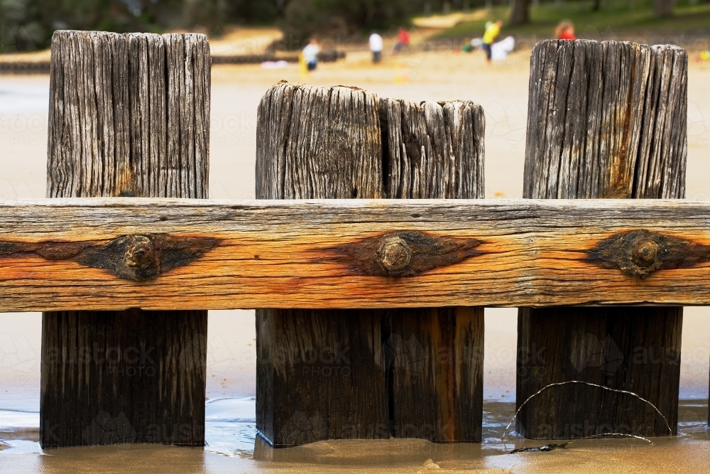Close up of groyne at sheltered beach - Australian Stock Image