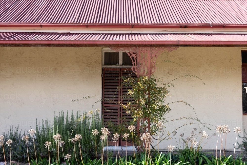 close up of heritage house window with shutters - Australian Stock Image