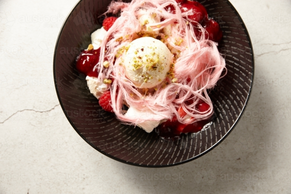 Close up of ice cream and fairy floss dessert - Australian Stock Image