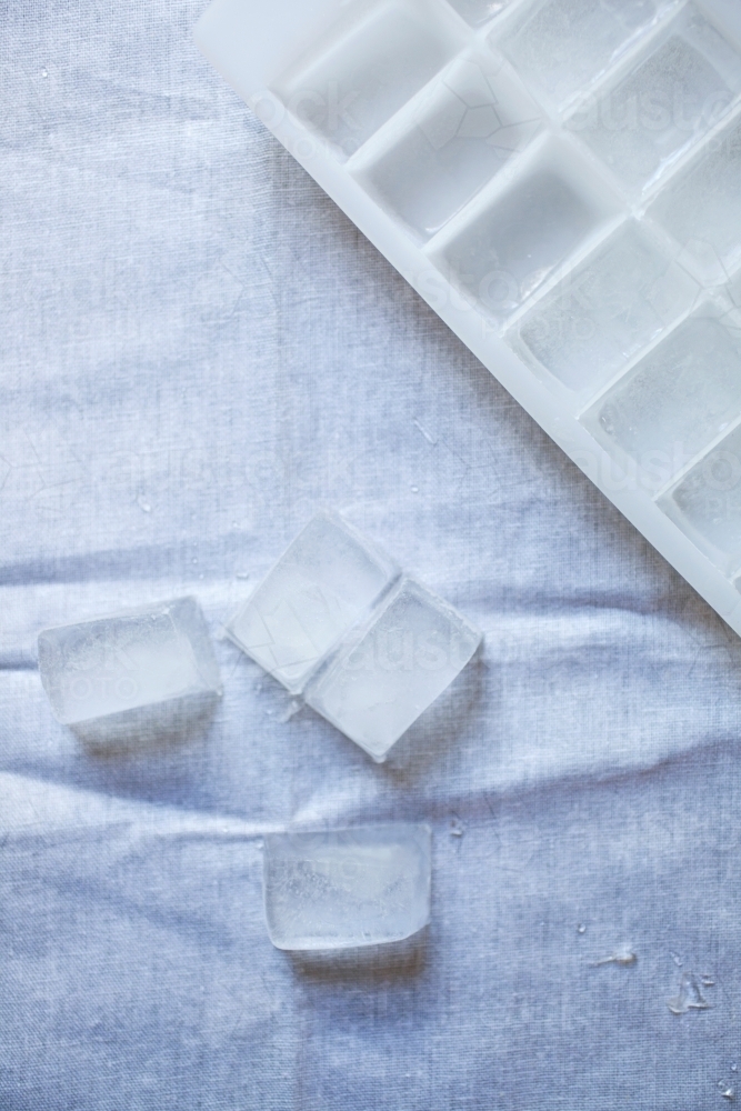 close up of ice on a table cloth - Australian Stock Image