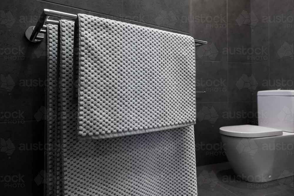 Close up of luxury bathroom towels in a monochrome ensuite - Australian Stock Image