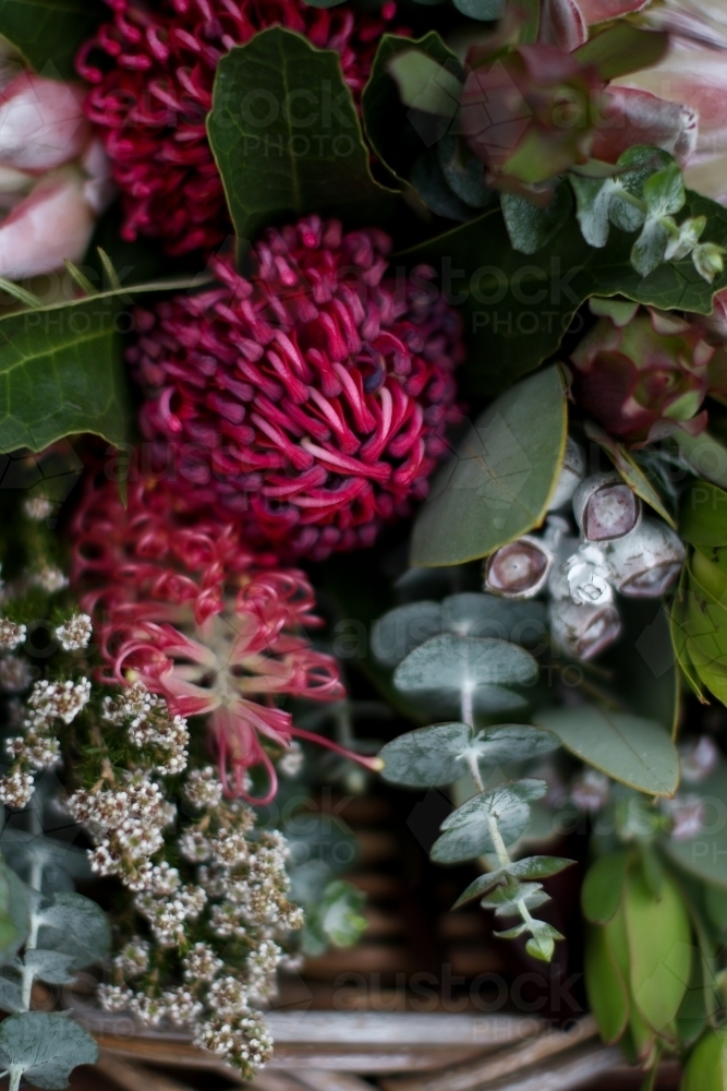 Close up of native floral arrangement in a wicker basket - Australian Stock Image
