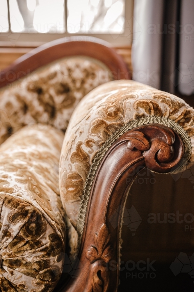 Close-up of old loveseat arm - Australian Stock Image