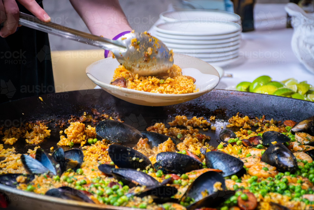 Close up of serving Paella with mussels - Australian Stock Image