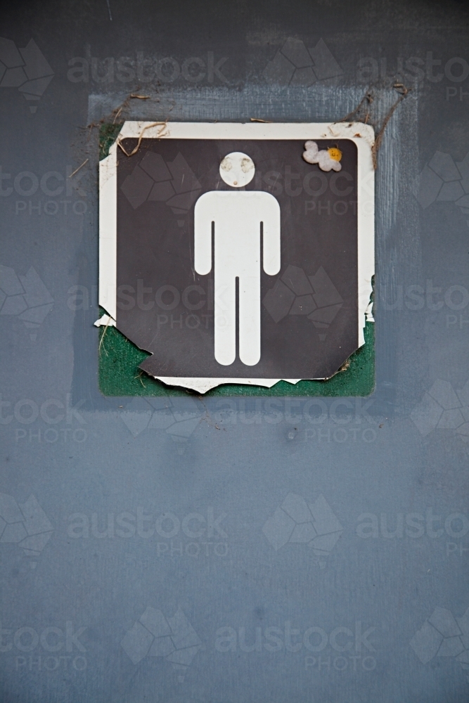 Close up of signs on public restroom toilet doors - Men's - Australian Stock Image