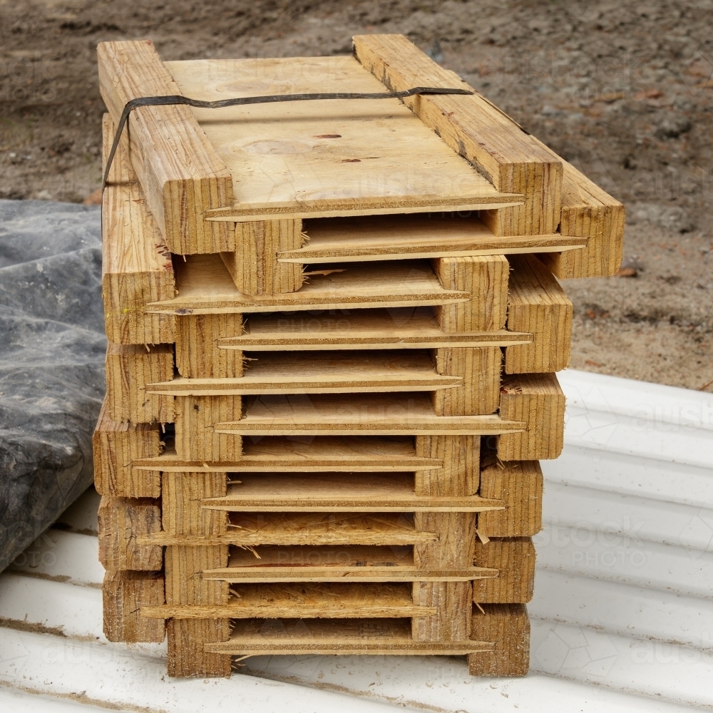 Close-up of stack of new timber i-joists for building renovation - Australian Stock Image