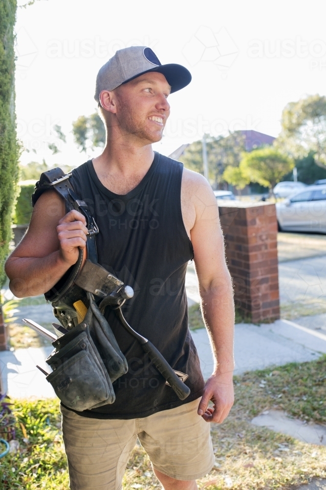 Close up of tradesman with toolbelt - Australian Stock Image