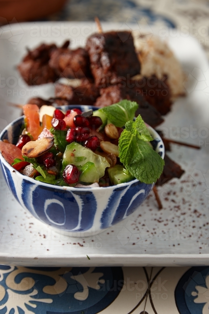 Close up of turkish pomegranate side salad - Australian Stock Image