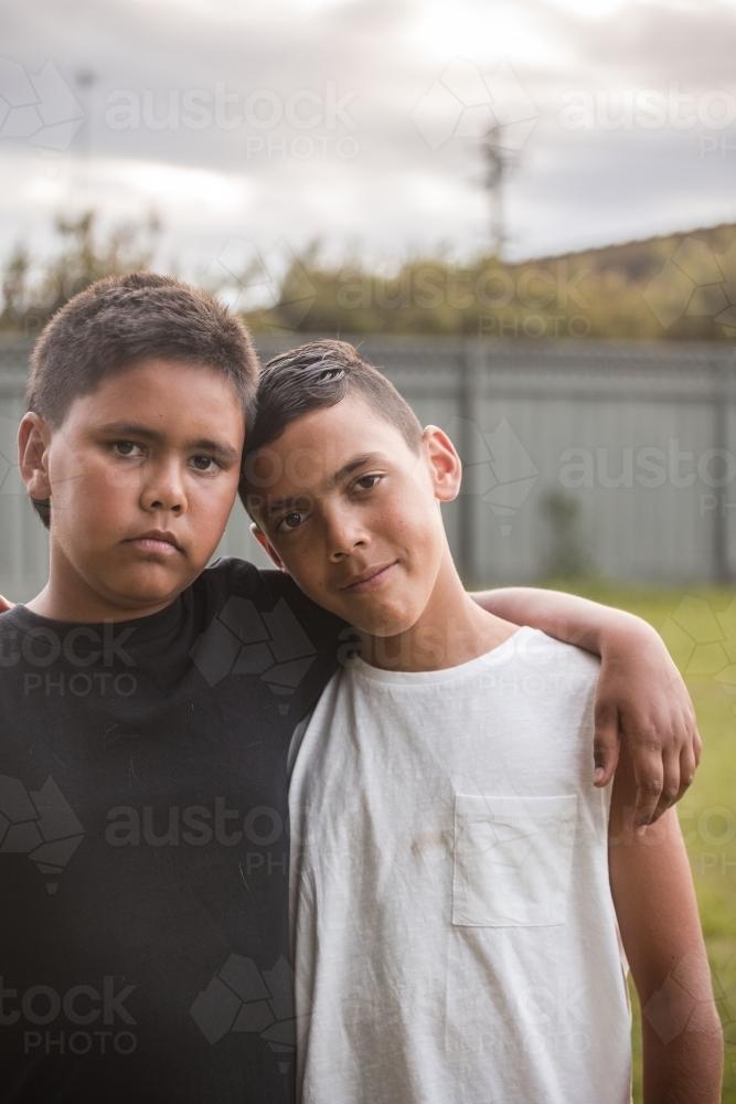 Image of Close up of two aboriginal boys with their arms around each ...